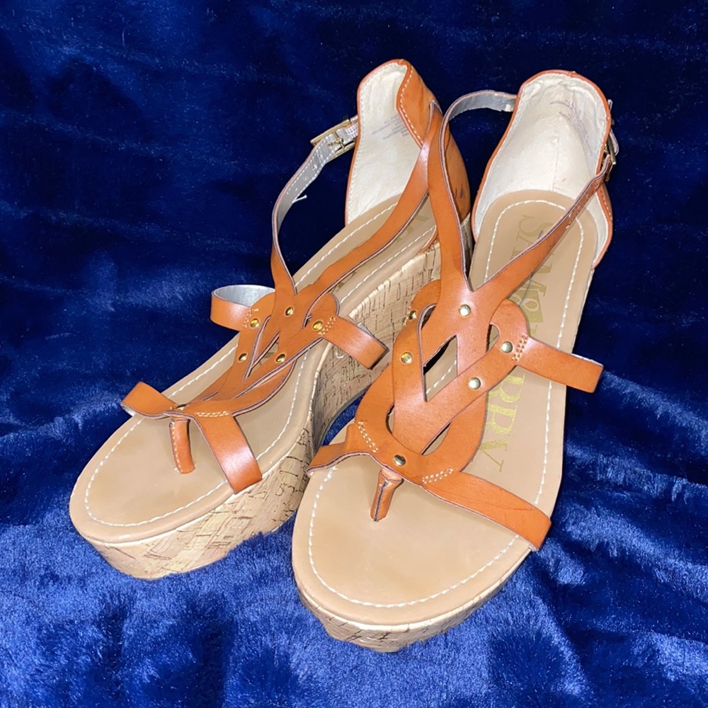 SAM EDELMAN. BROWN SANDALS. CORK LIKE HEELS. STRAPPY. GOLD BUCKLE. SUPER STYLISH